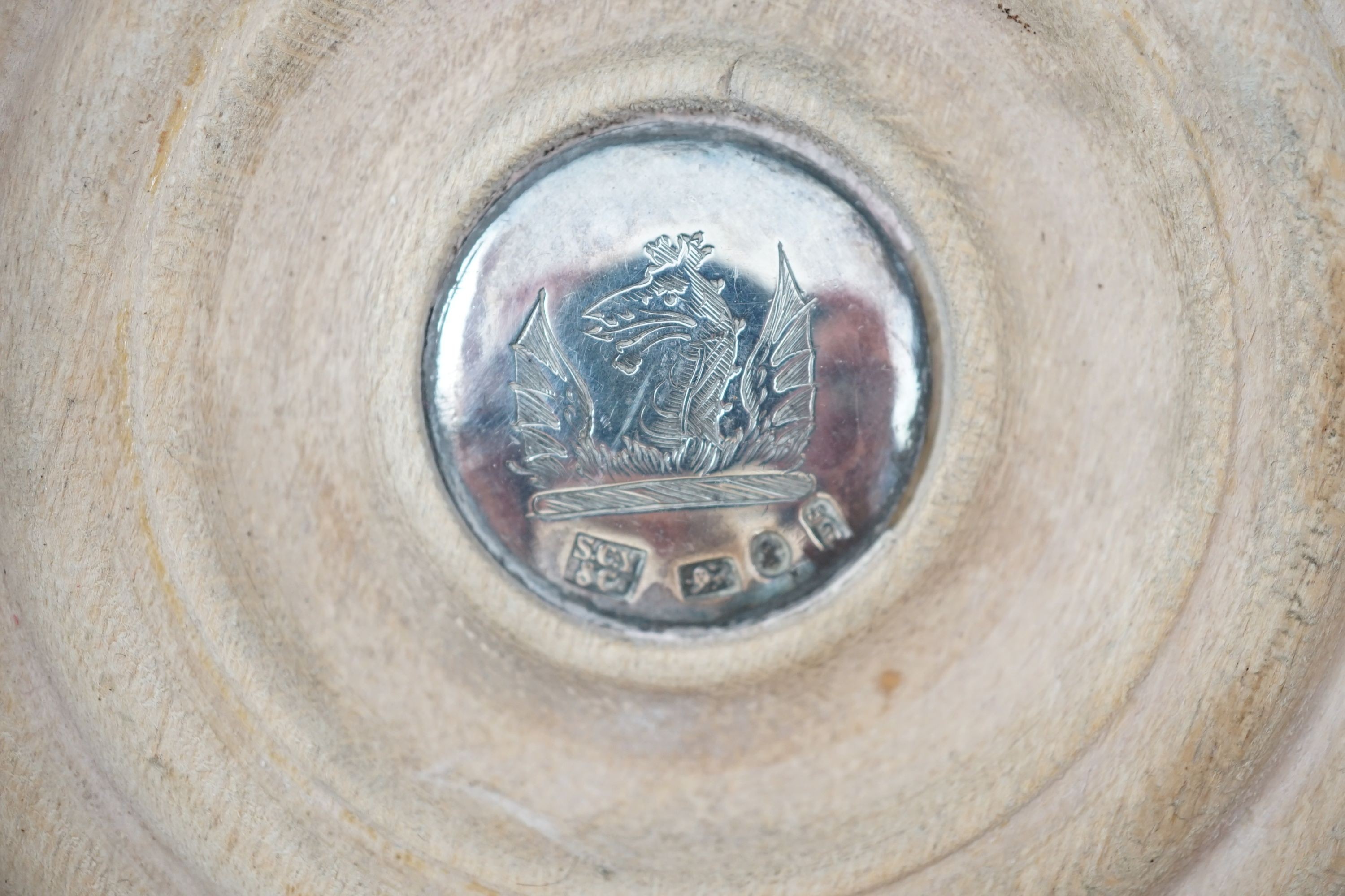 A pair of George IV silver mounted wine coasters, by S.C. Younge & Co